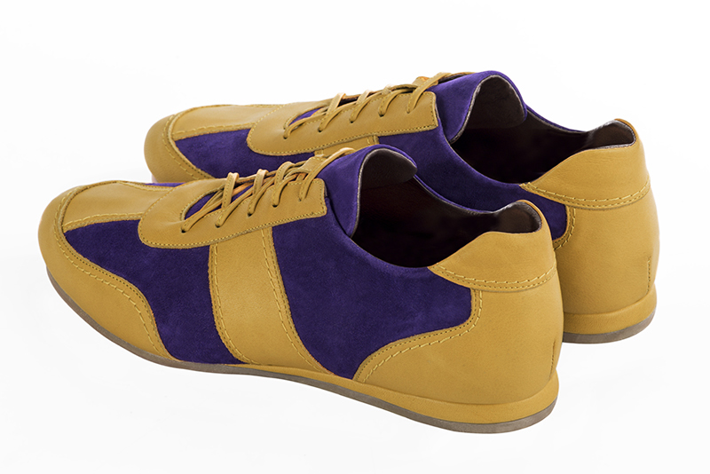 Mustard yellow two-tone dress sneakers for men. Round toe. Flat wedge soles. Rear view - Florence KOOIJMAN