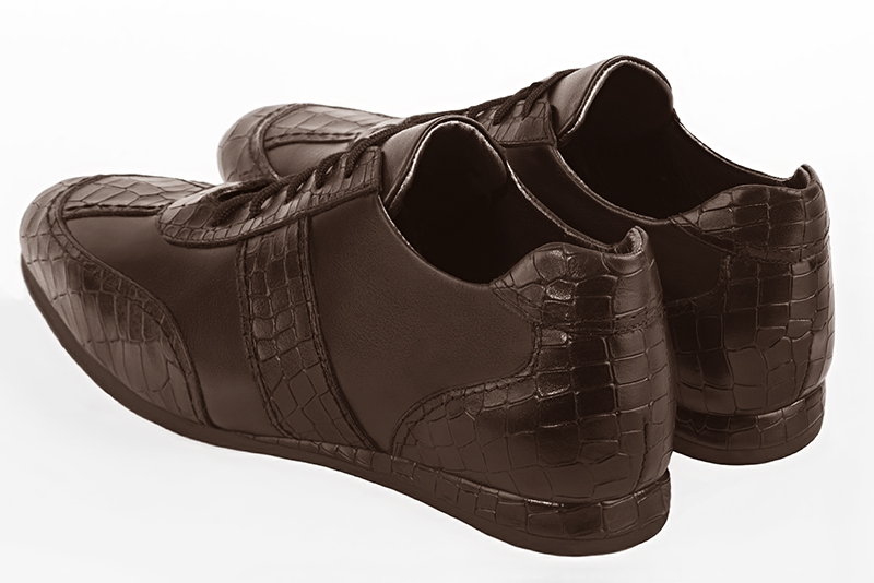 Dark brown one-tone dress sneakers for men. Round toe. Flat rubber soles. Rear view - Florence KOOIJMAN