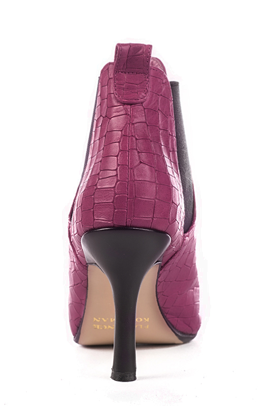 Women's fuchsia pink and matt black elegant Chelsea ankle boots, with side elastics. Pointed toe. High slim heel - Worn view