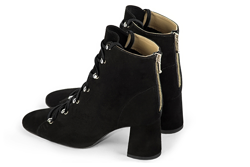 Matt black women's ankle boots with laces at the front. Round toe. Medium flare heels. Rear view - Florence KOOIJMAN
