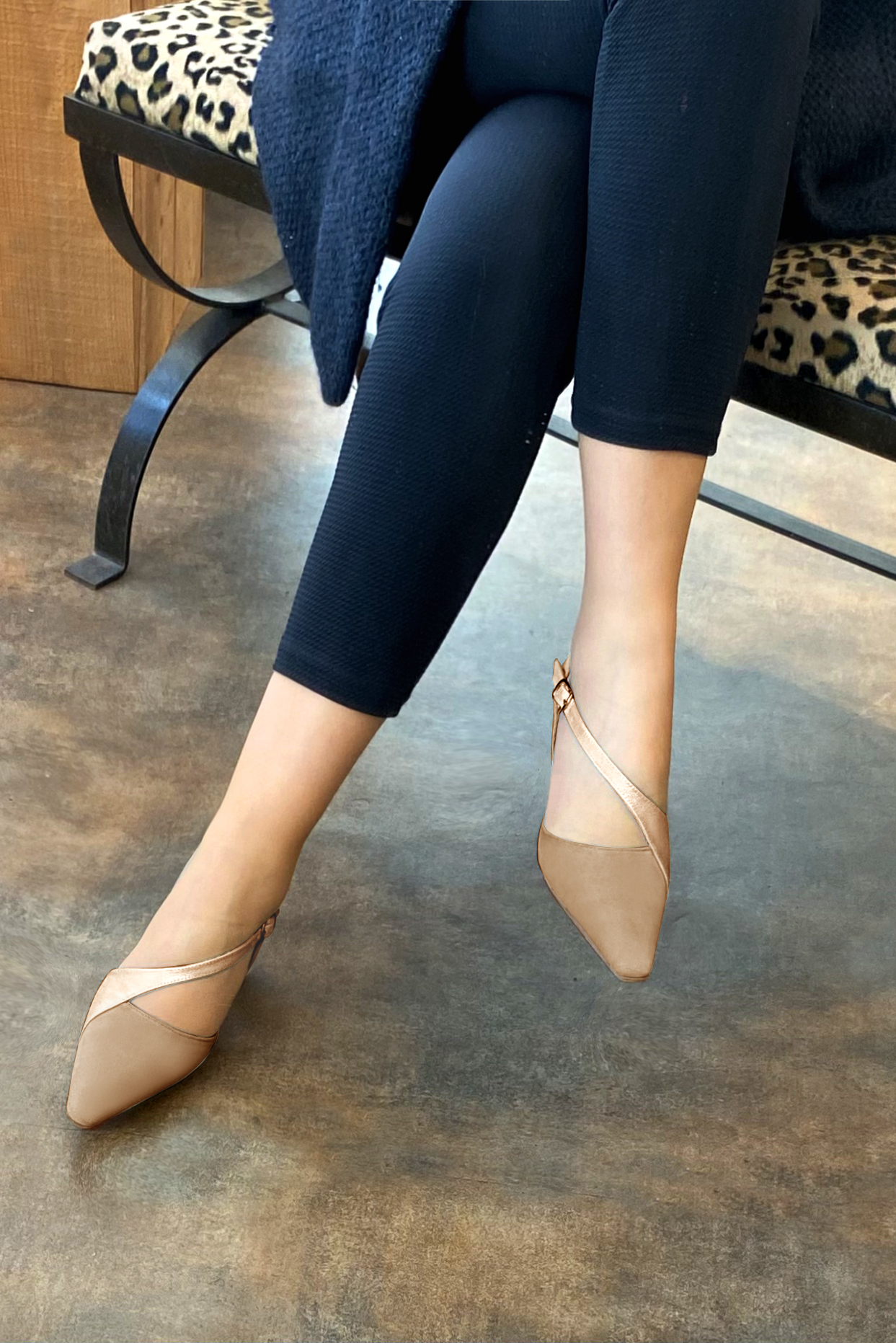 Tan beige and powder pink women's open back shoes, with an instep strap. Tapered toe. Medium comma heels. Worn view - Florence KOOIJMAN