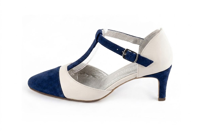 Handcrafted women's comfortable and elegant T-strap closed-back heels in premium navy blue and off white leather. Medium comma heels. Round toe. Perfect for women's wedding guest heels, or elevated everyday style. 
                Choose from our luxurious collections of leather and fabric to perfectly match your heels to your outfits. - Florence KOOIJMAN