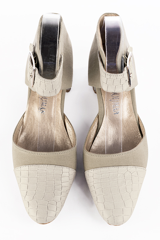 Off white and natural beige women's open side shoes, with a strap around the ankle. Round toe. Low flare heels. Top view - Florence KOOIJMAN
