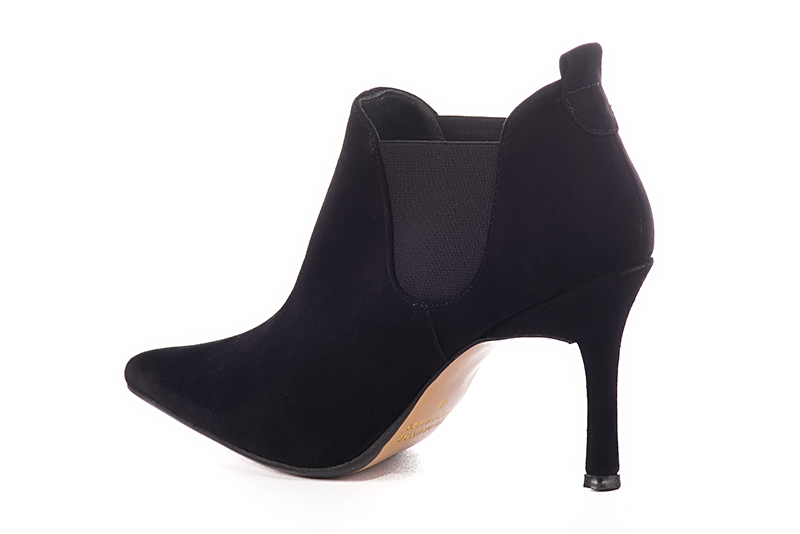 Matt black women's ankle boots with buckles on the sides. Pointed toe. Very high slim heel. Rear view - Florence KOOIJMAN