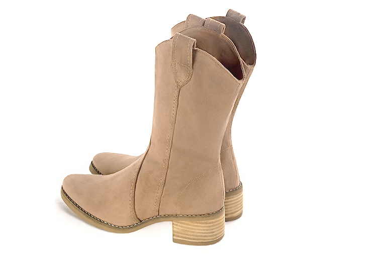 Tan beige women's ankle boots with a zip on the inside. Round toe. Low leather soles. Rear view - Florence KOOIJMAN