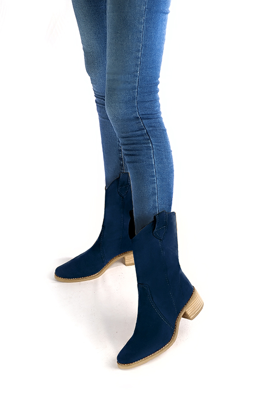Navy blue women's ankle boots with a zip on the inside. Round toe. Low leather soles. Worn view - Florence KOOIJMAN