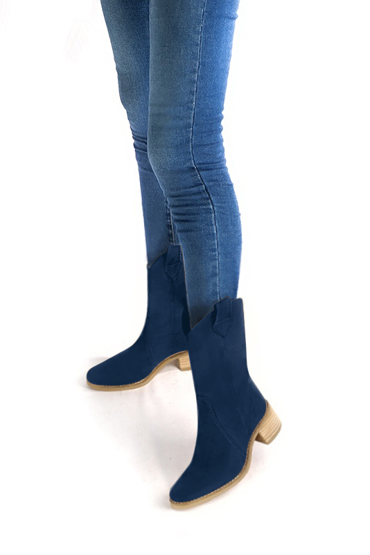 Navy blue women's ankle boots with a zip on the inside. Round toe. Low leather soles. Worn view - Florence KOOIJMAN