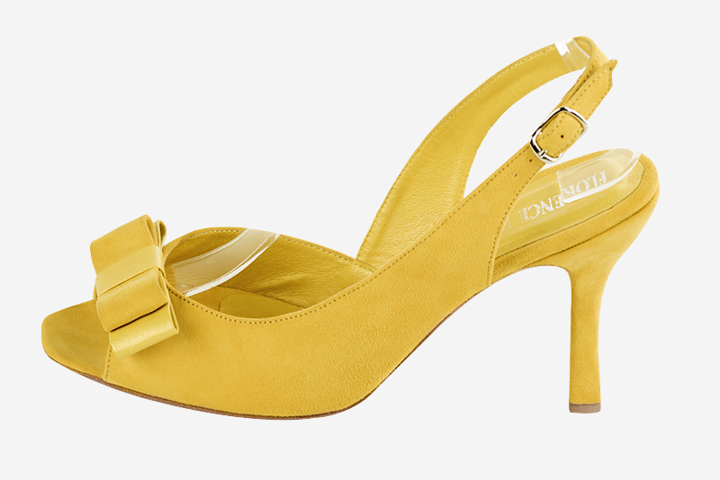 3 3&frasl;8 inch / 8.5 cm high spool heels. Profile view - Florence KOOIJMAN